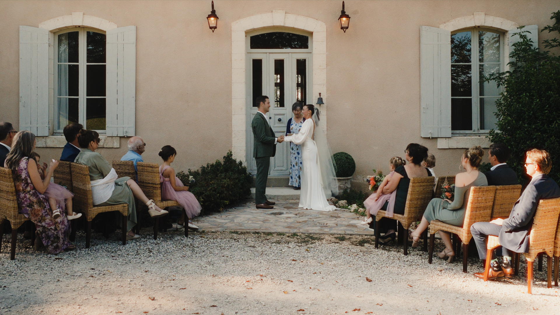 Intimate outdoor wedding ceremony at Château de Monciaux in Dordogne